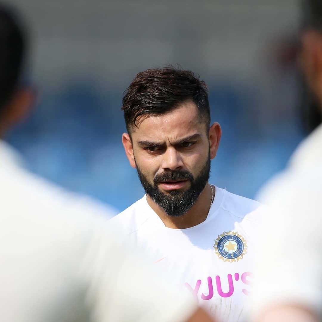 viratkohli-between-kl-rahul-and-dhawan